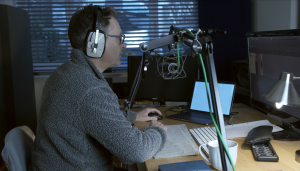 jono voicing in the studio